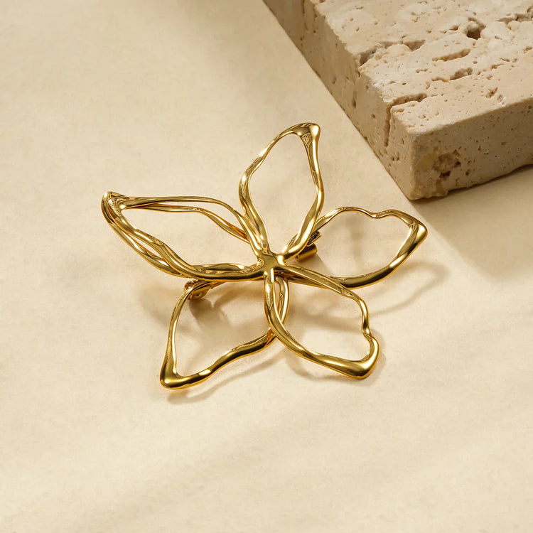 Broches in de vorm van bloemen, vlinders en dieren, versierd met parels en kristallen – elegante accessoires van Twinolo.
