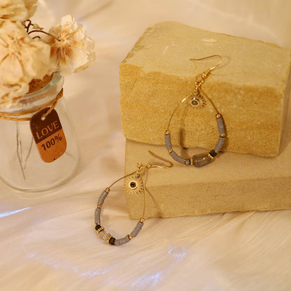 Hoop Earrings with Sun Pendant – Warm and Radiant | Twinolo